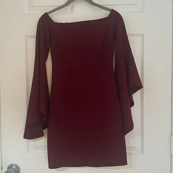 burgundy dress with bell sleeves Berrylush Women Solid Maroon Round Neck Bell Sleeves A-Line Mini Dress main image 0